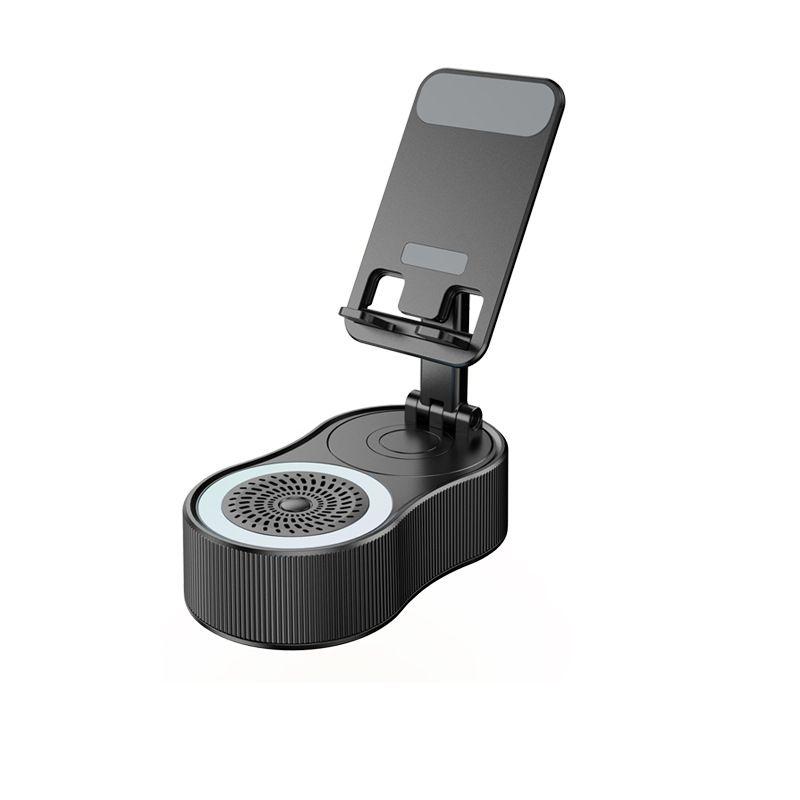 Phone stand integrated bluetooth speaker