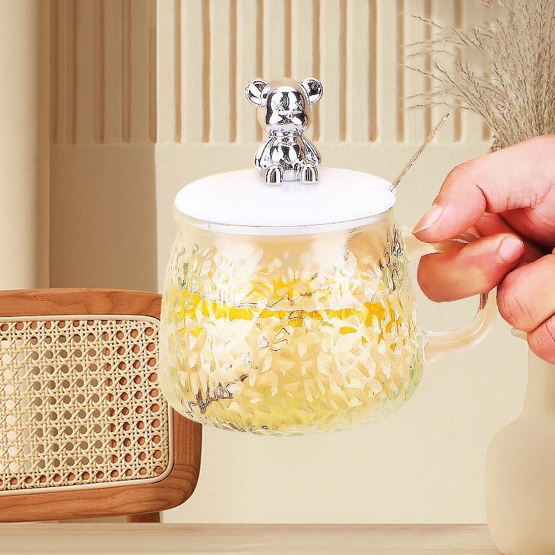 Beverage cup with spoon