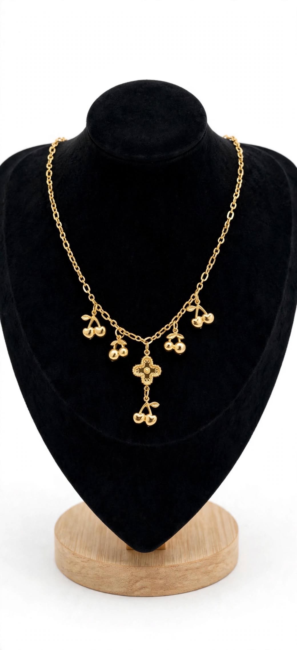 Gold cherry charm necklace with clover pendant