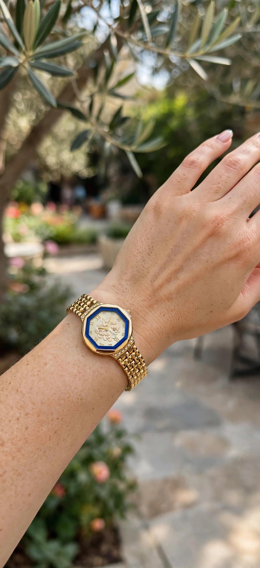 Octagonal floral gold watch - royal blue bezel