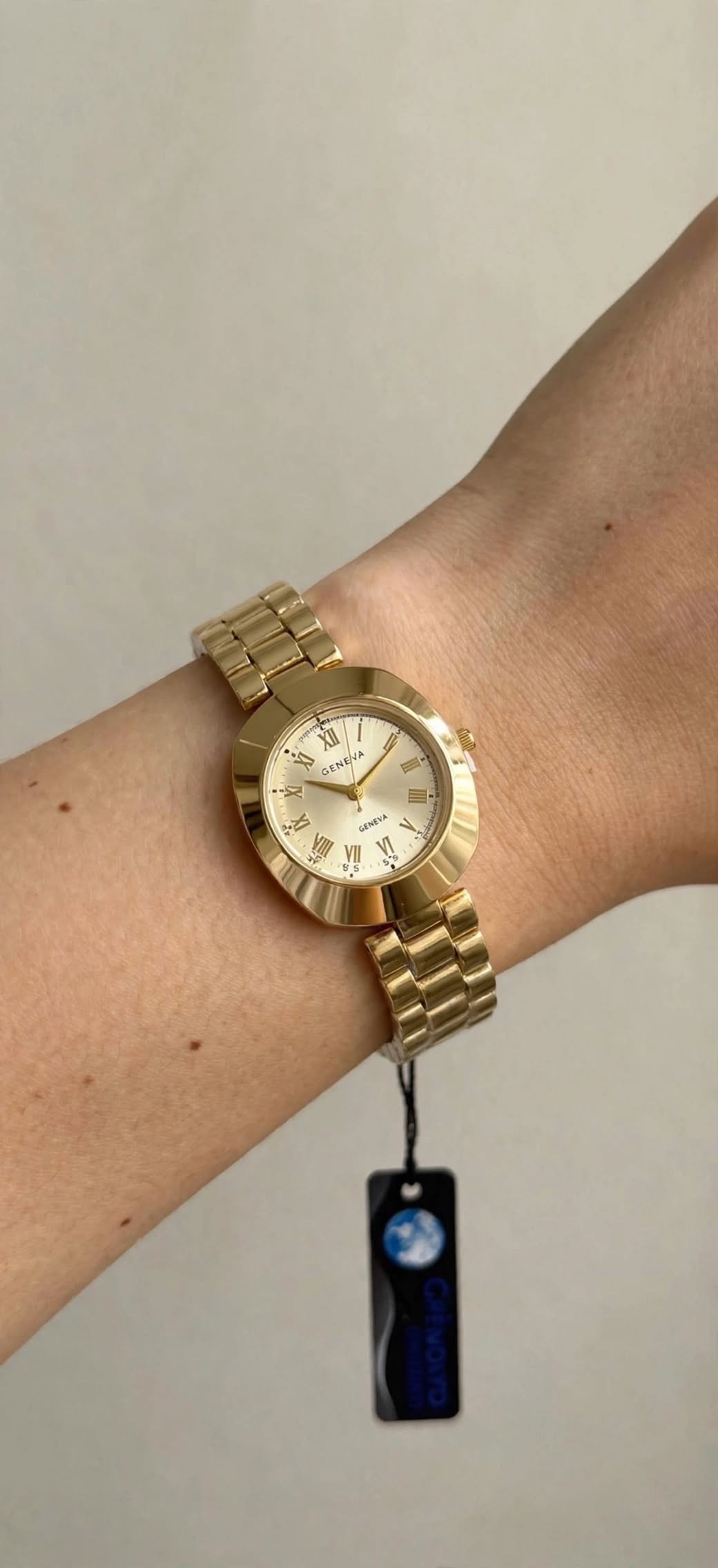 Classic roman oval gold watch