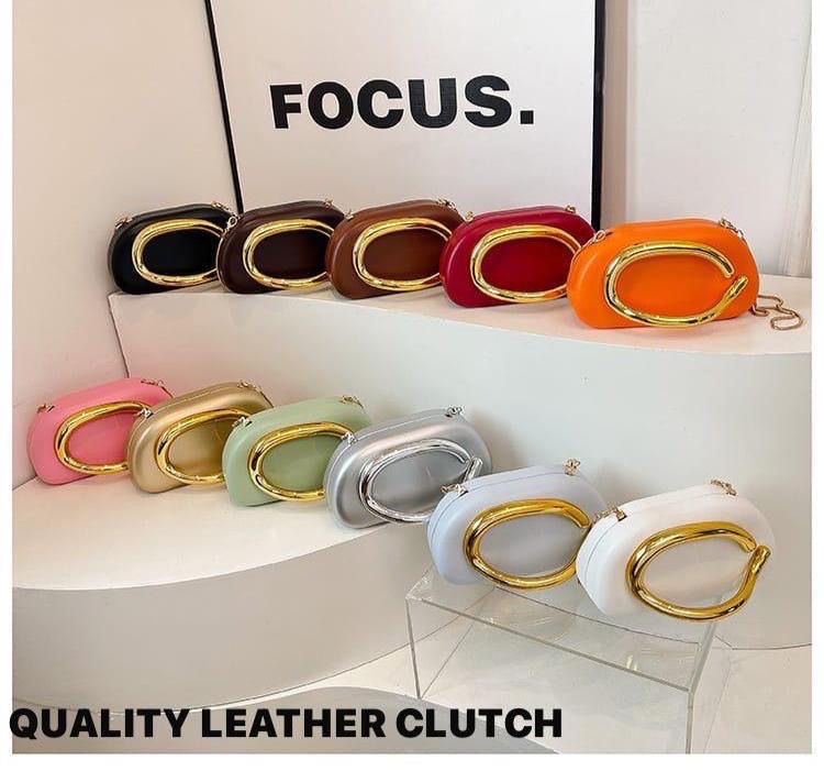 Oval gold c-hook leather clutch bag - quality leather party