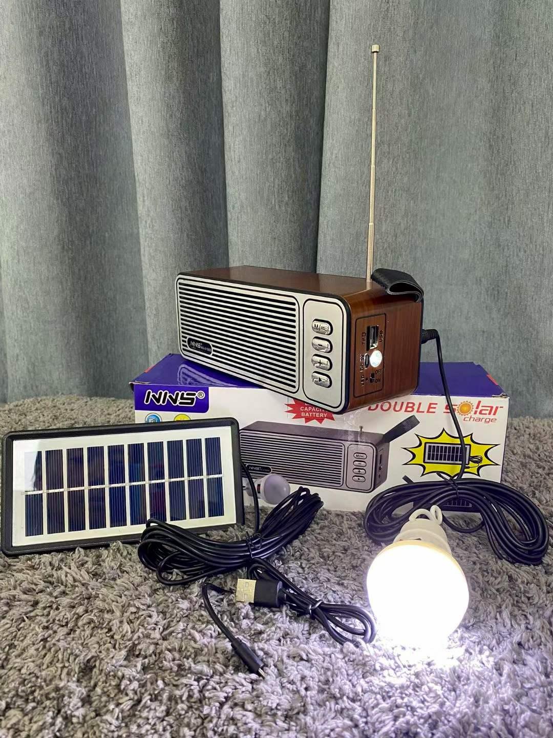 Music box with solar panel and light