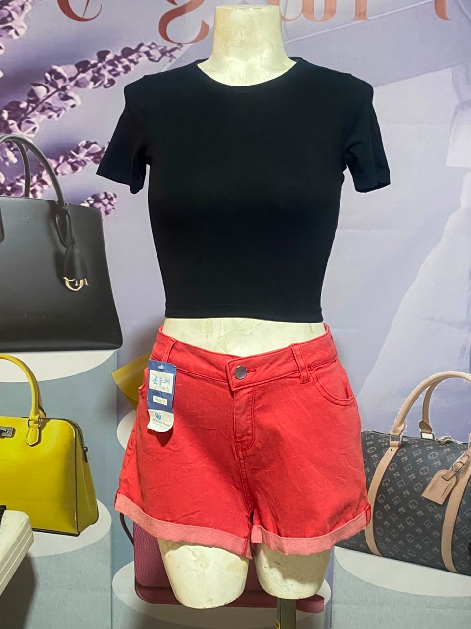 Black top and red jeans short