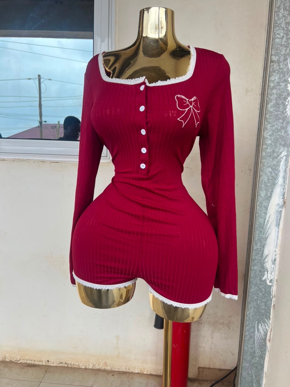 The bow & button romper