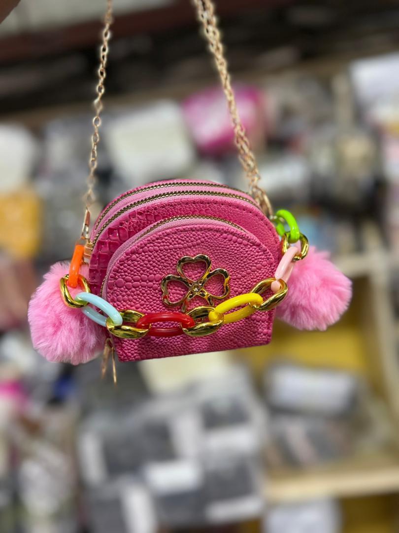 Small pink women’s crossbody/shoulder bag